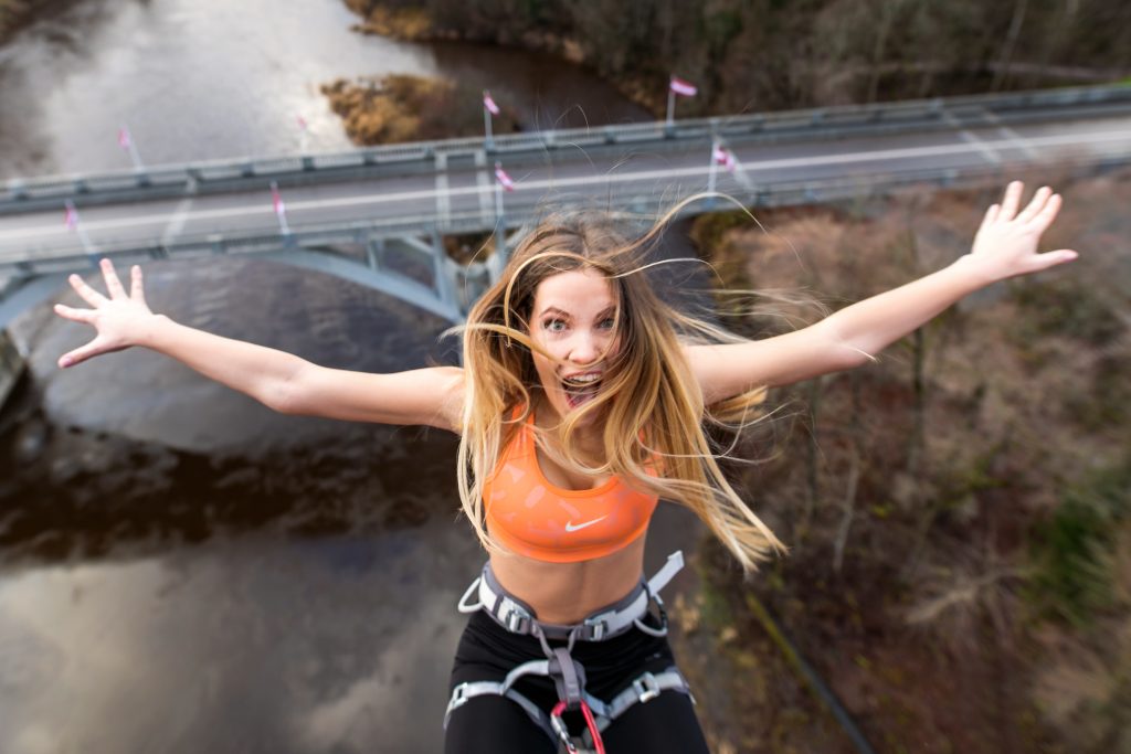 Bungee jumper preparing for the jump from the Sigulda cable car